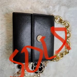 Chanel CC trifold wallet